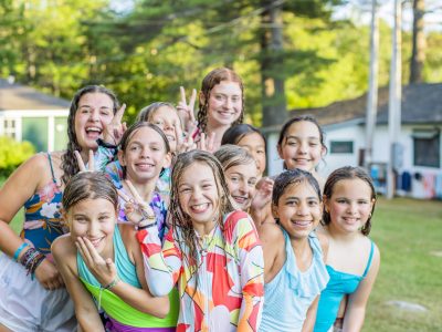 A group of camp friends smiling